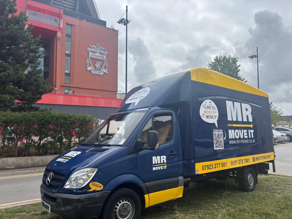 Mr Move It van on a town-centre street